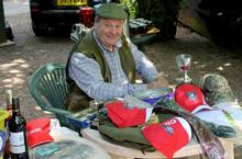 Treasurer Ian Valentine taking in the days entries