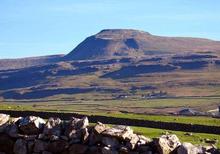 Ingleborough rising at 2,372 feet above sea level